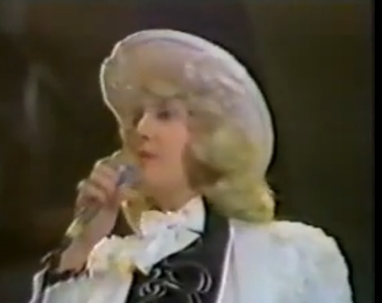 What's she singing about? Click photo to hear the answer.